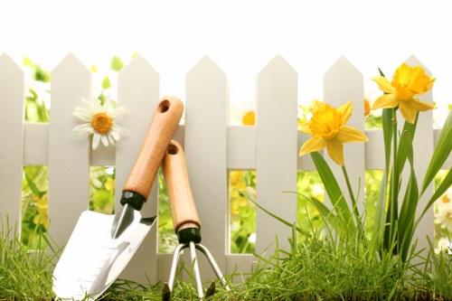 Professional installation of metal garden fence